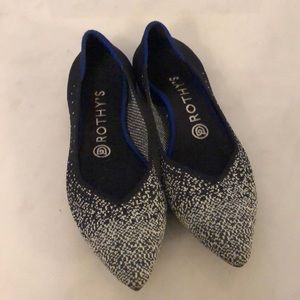 Rothy’s navy and silver point toe flat